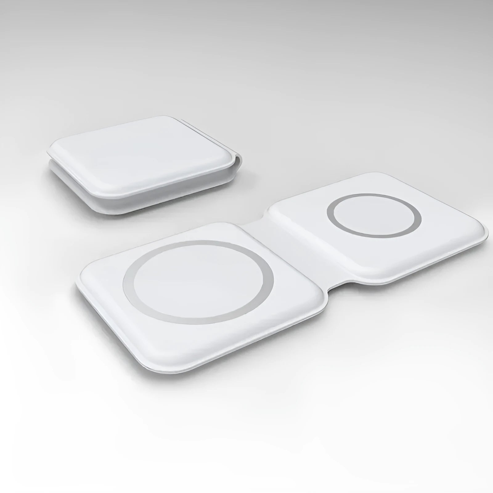 White foldable magnetic wireless charging dock showing dual-device support and adjustable angle.