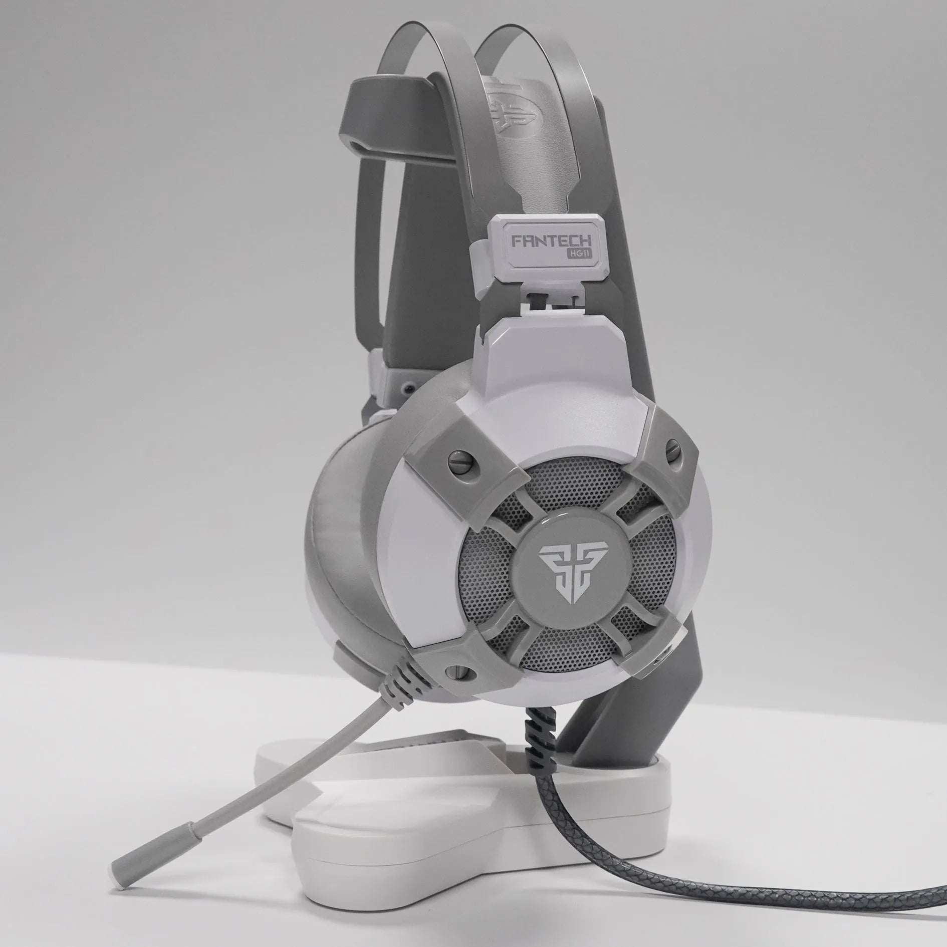 Black FANTECH HG11 gaming headset with microphone, RGB lights, and USB cable