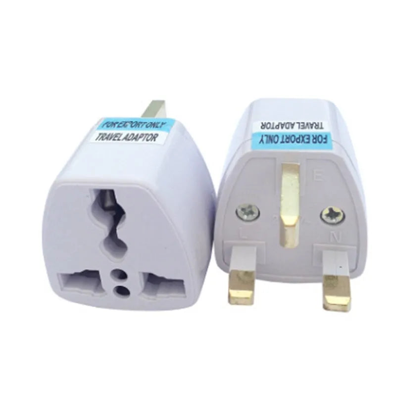 Multi country conversion plug in white with AU EU German UK and US style options on a neutral background