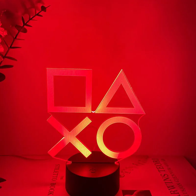 Creative gamepad-shaped 3DLED desk lamp with acrylic shade on an ABS base.