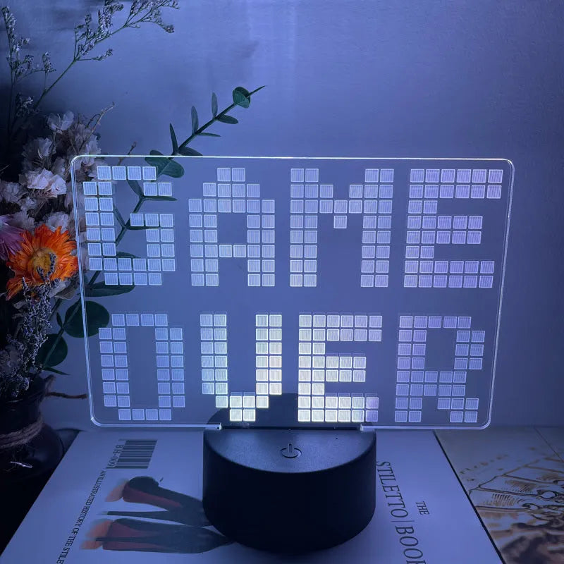 Creative gamepad-shaped 3DLED desk lamp with acrylic shade on an ABS base.