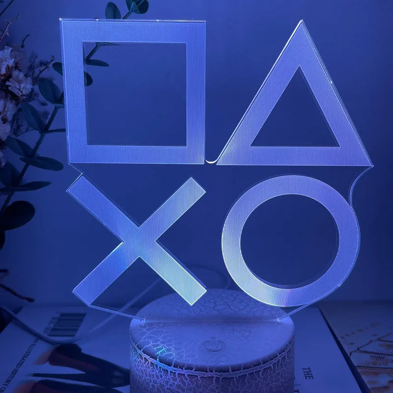 Creative gamepad-shaped 3DLED desk lamp with acrylic shade on an ABS base.