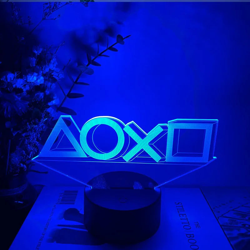 Creative gamepad-shaped 3DLED desk lamp with acrylic shade on an ABS base.