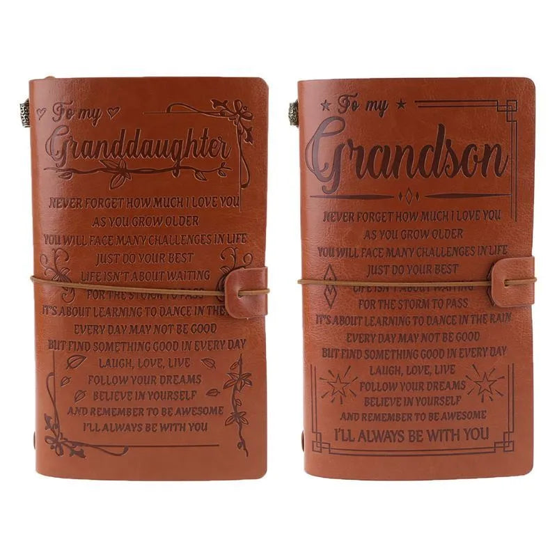 Brown leather hand ledger notebook with strap binding showing warm brown acid-free paper inside