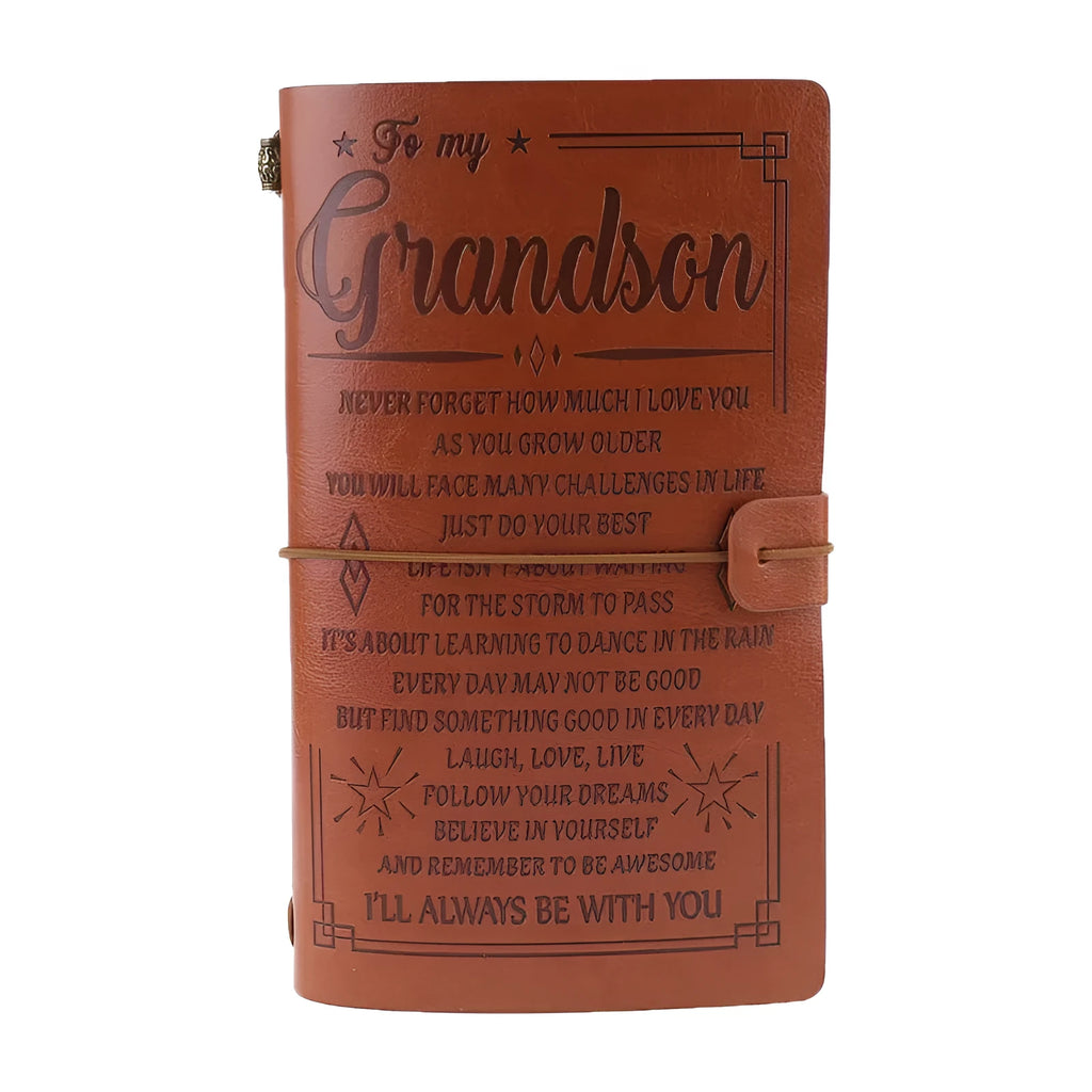 Brown leather hand ledger notebook with strap binding showing warm brown acid-free paper inside