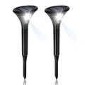 Solar-powered ground plug light with lamp pole for outdoor garden illumination.