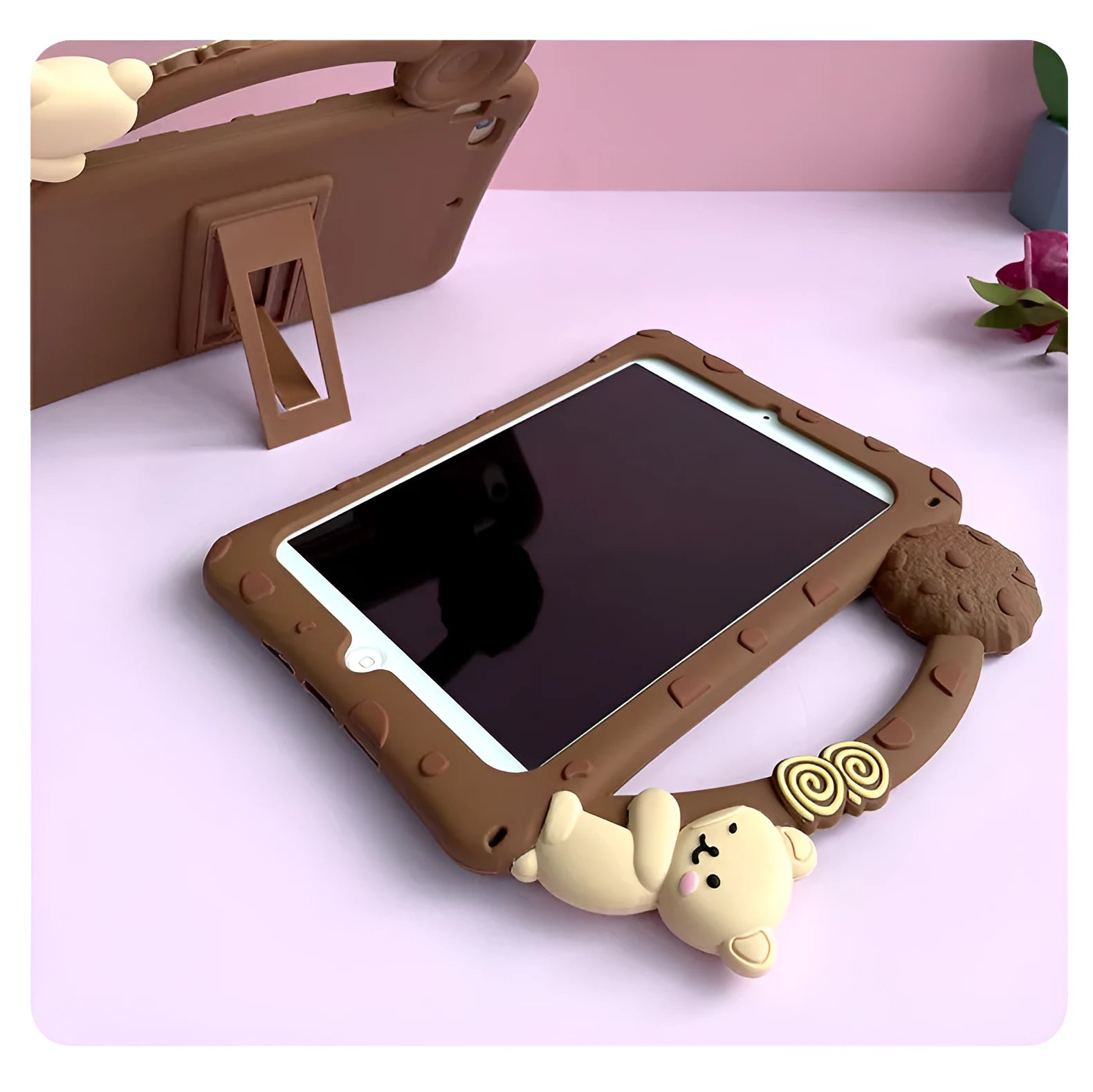 Brown cartoon-design silicone case for iPad with integrated folding stand in portrait and landscape viewing angles.