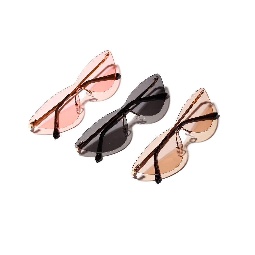 Brown vintage-style adult sunglasses with metal frame and tinted lenses.