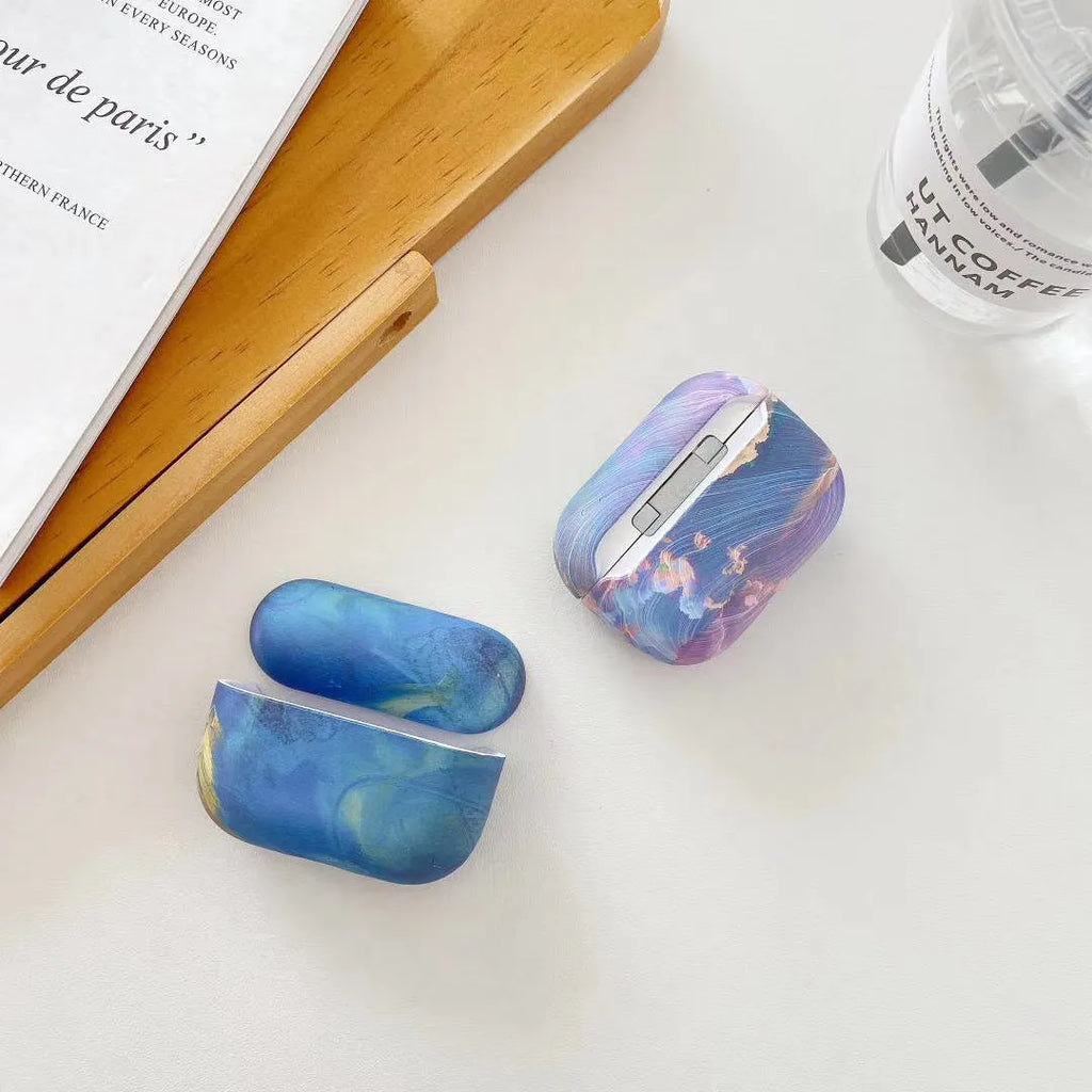Blue and pink watercolour hard plastic protective case for Apple AirPods Pro, AirPods 1, and AirPods 2.