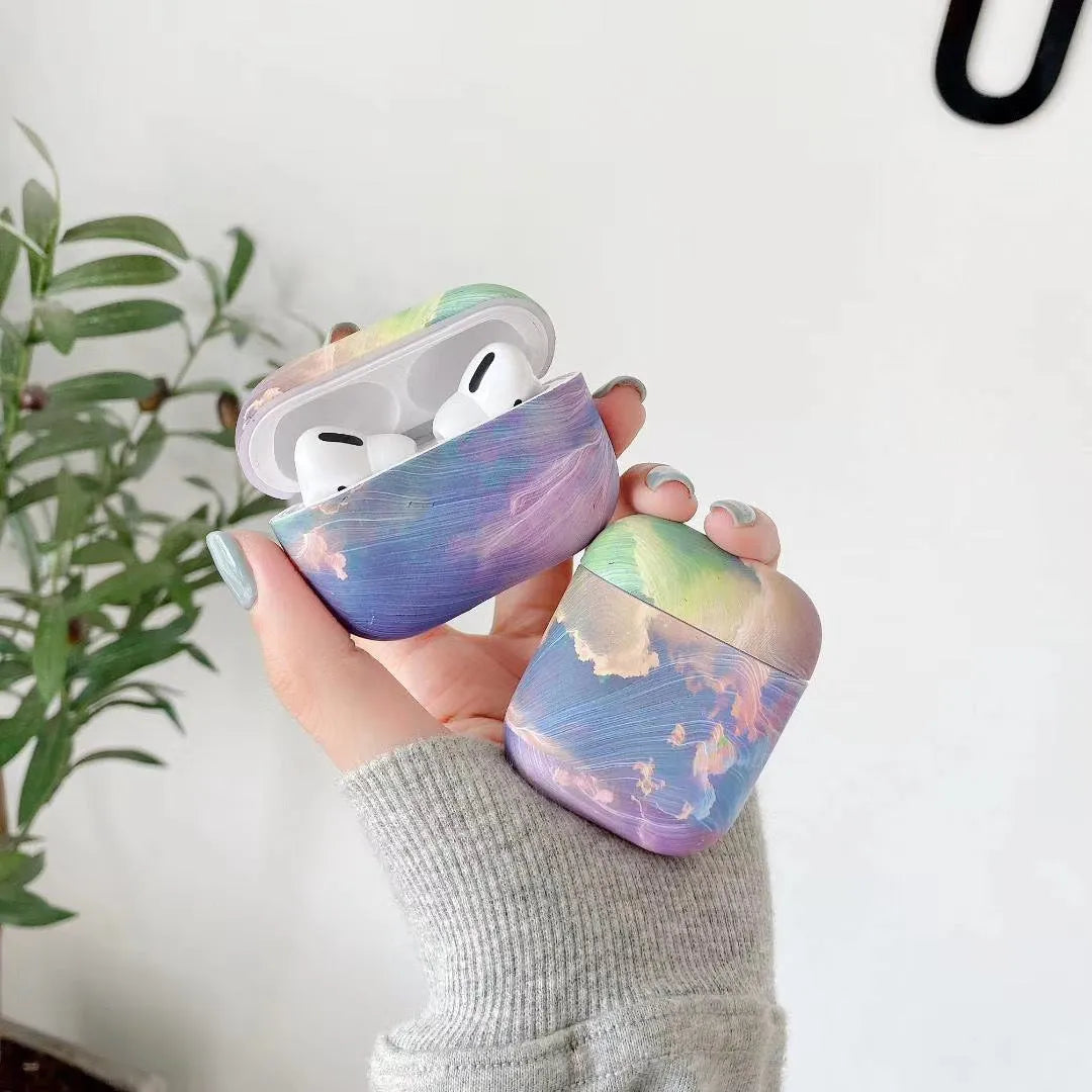 Blue and pink watercolour hard plastic protective case for Apple AirPods Pro, AirPods 1, and AirPods 2.