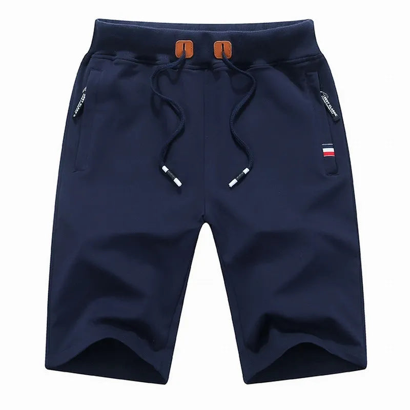 Men's cotton drawstring summer shorts in green with elastic waist and pockets, side view