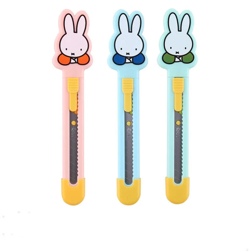 Cartoon character art knife with open box design showing plastic body and metal blade