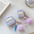 Purple silicone AirPods protective case with fur ball pendant attached to clamshell design