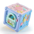 Blue baby musical hand drum toy with piano keys, geometric blocks, and easy-grip handle on white background