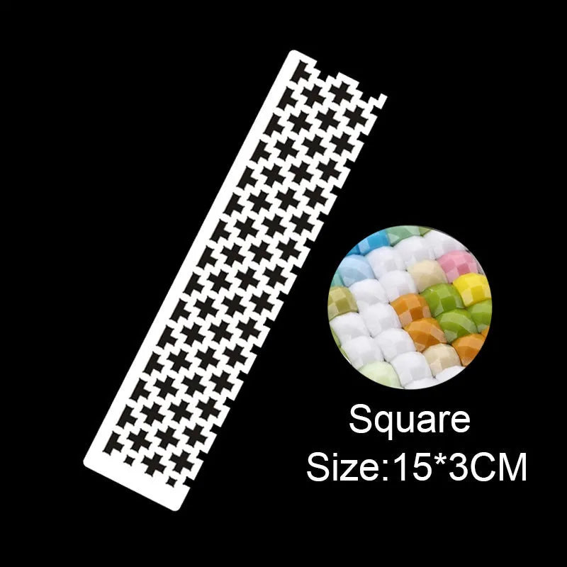 Stainless steel diamond painting ruler with square mesh grid for drill placement.