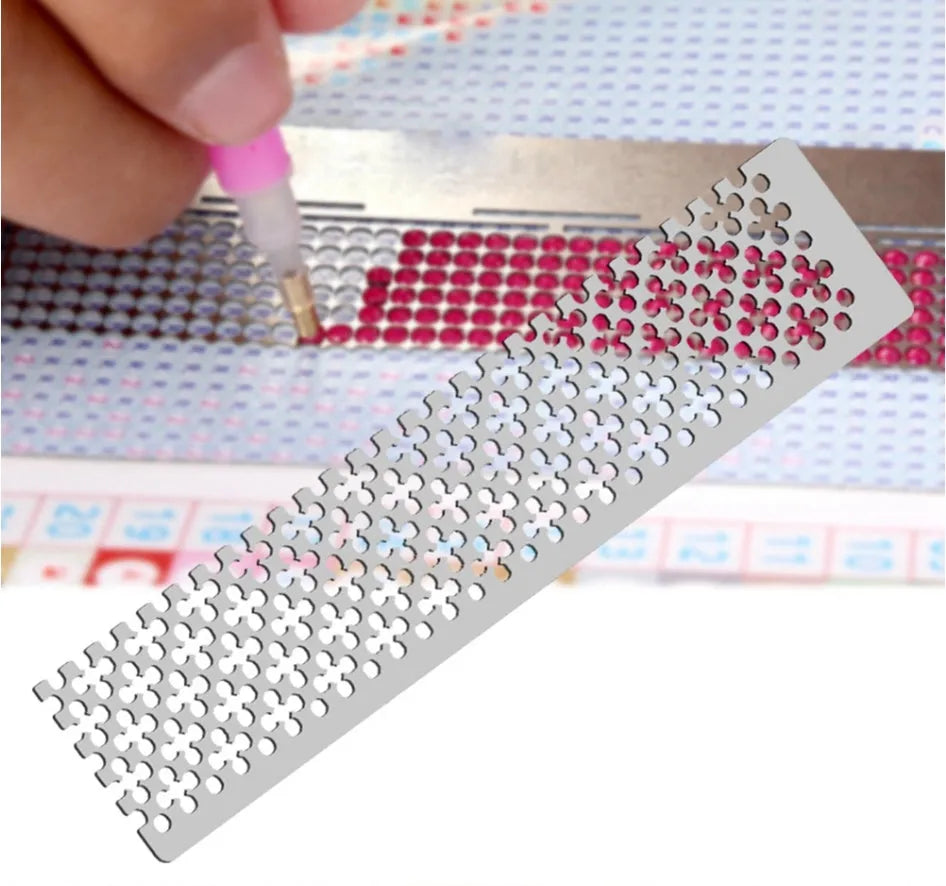 Stainless steel diamond painting ruler with square mesh grid for drill placement.