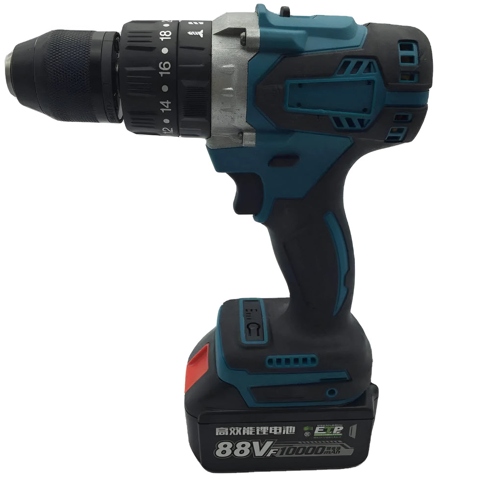Black and yellow cordless impact drill with lithium battery on a workbench with drill bits.