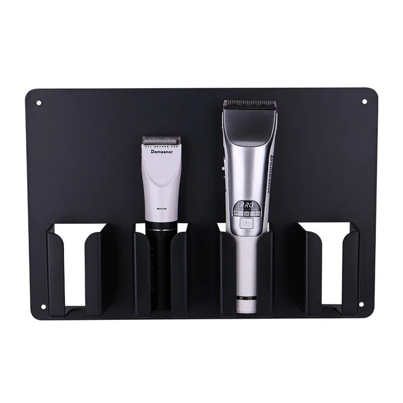 Black plastic wall-mounted rack holding four hair clippers with screws for assembly