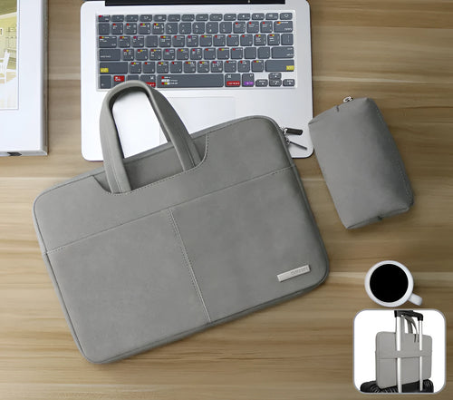 Blue PU leather laptop bag open, showing padded computer sleeve and internal organiser pockets.