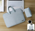 Blue PU leather laptop bag open, showing padded computer sleeve and internal organiser pockets.