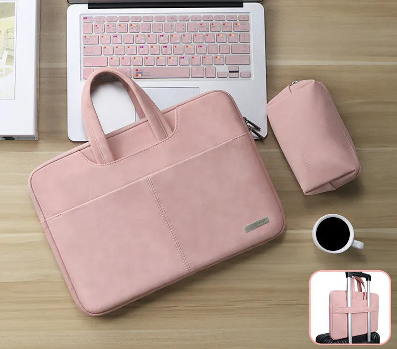 Blue PU leather laptop bag open, showing padded computer sleeve and internal organiser pockets.