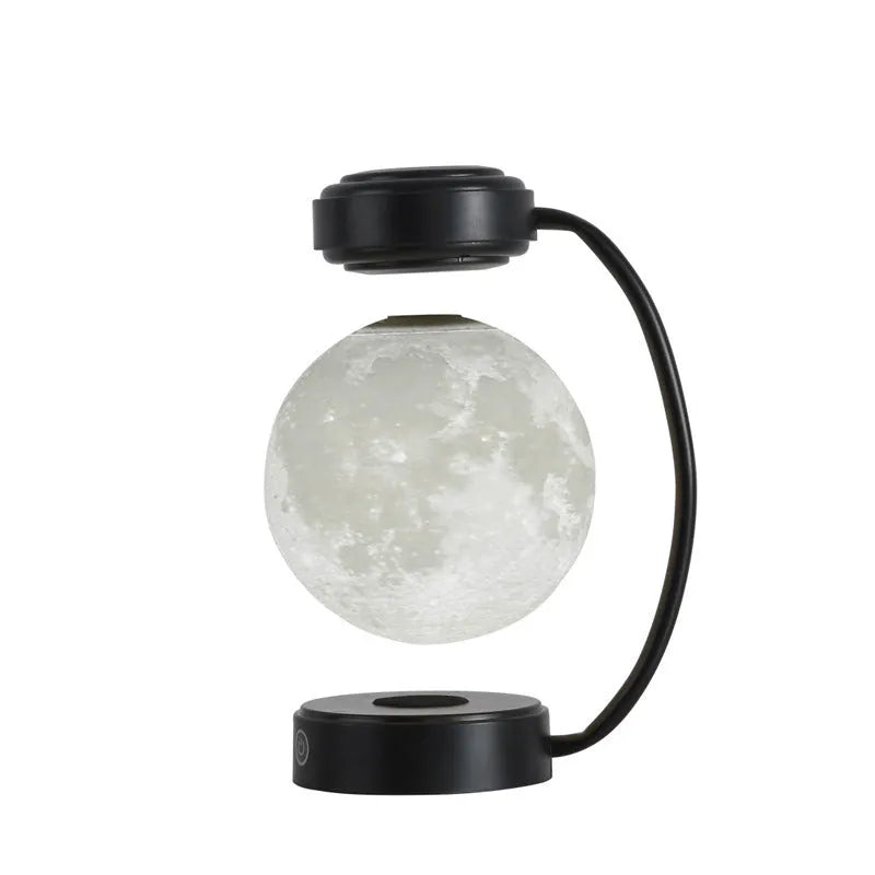 Magnetic levitation moon lamp floating above base with touch controls and 3-colour lighting