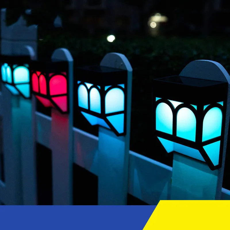 Square white solar wall lamp mounted on outdoor fence with LED illumination