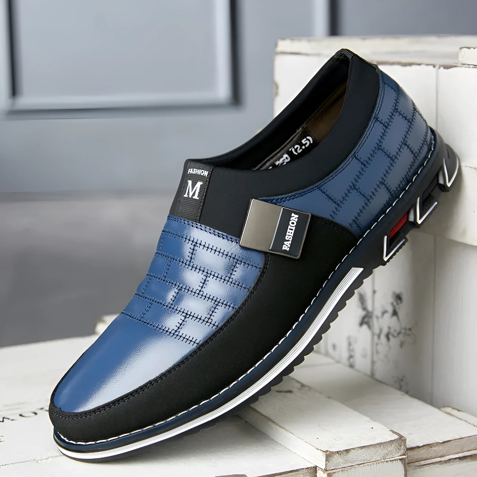 Men's black casual leather shoes with low upper height showing size label and sole detail