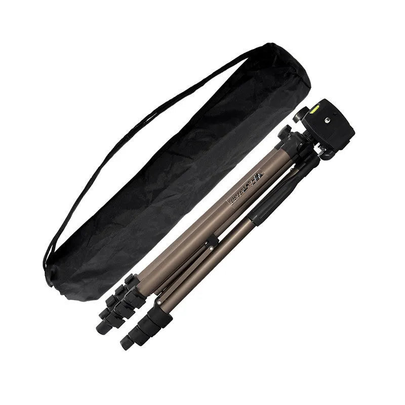 Aluminium camera tripod extended to 1.3m with hydraulic head, mobile phone holder, and Bluetooth remote on a table.