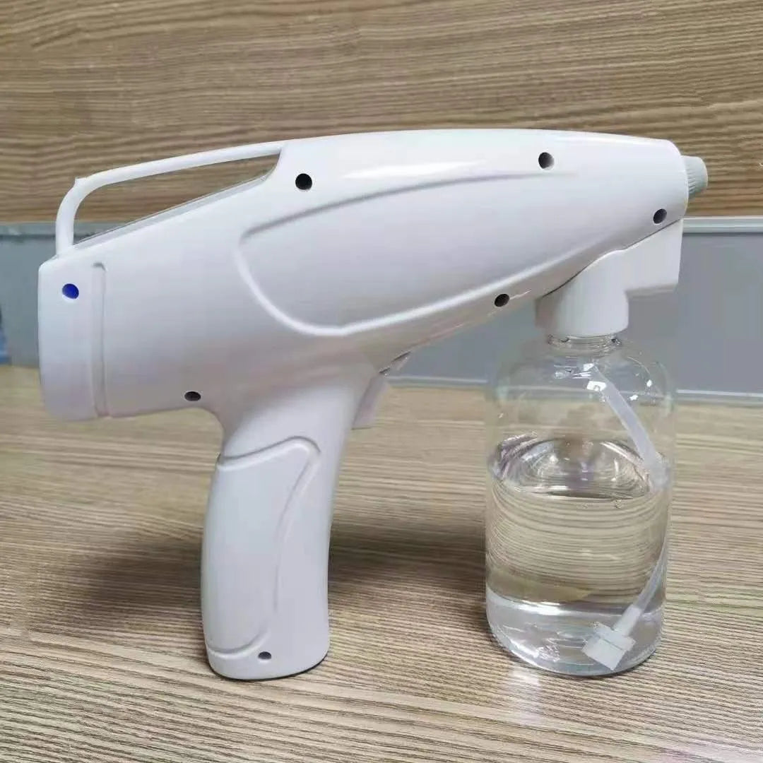 White handheld cordless electric disinfectant sprayer with USB-C charging port