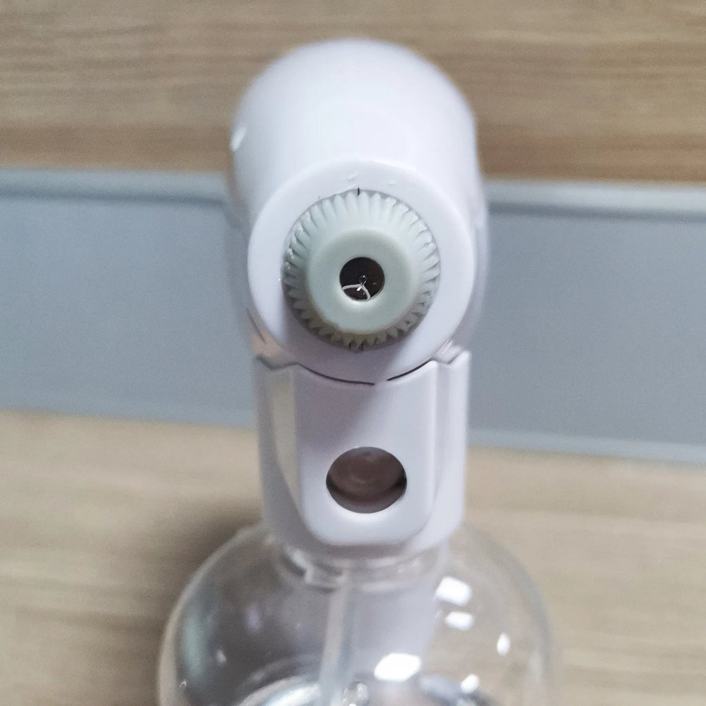 White handheld cordless electric disinfectant sprayer with USB-C charging port