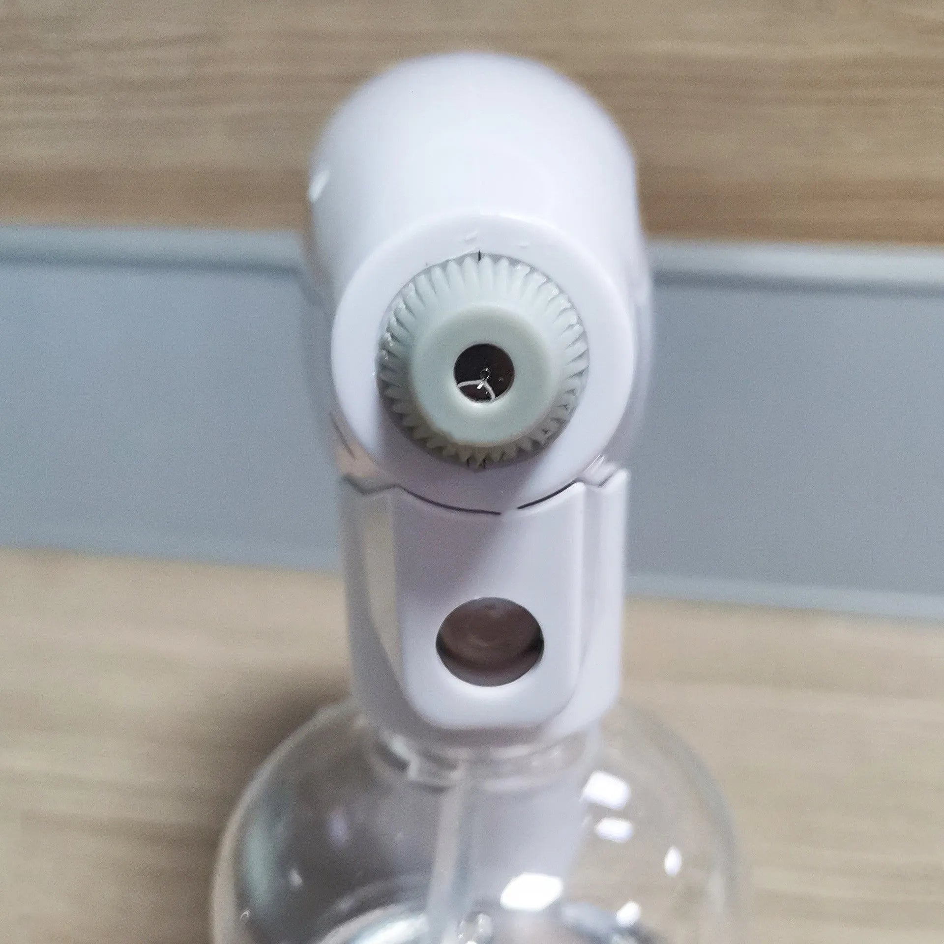 White handheld cordless electric disinfectant sprayer with USB-C charging port