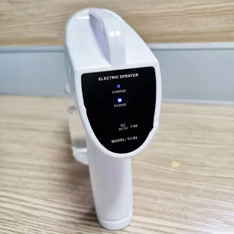 White handheld cordless electric disinfectant sprayer with USB-C charging port
