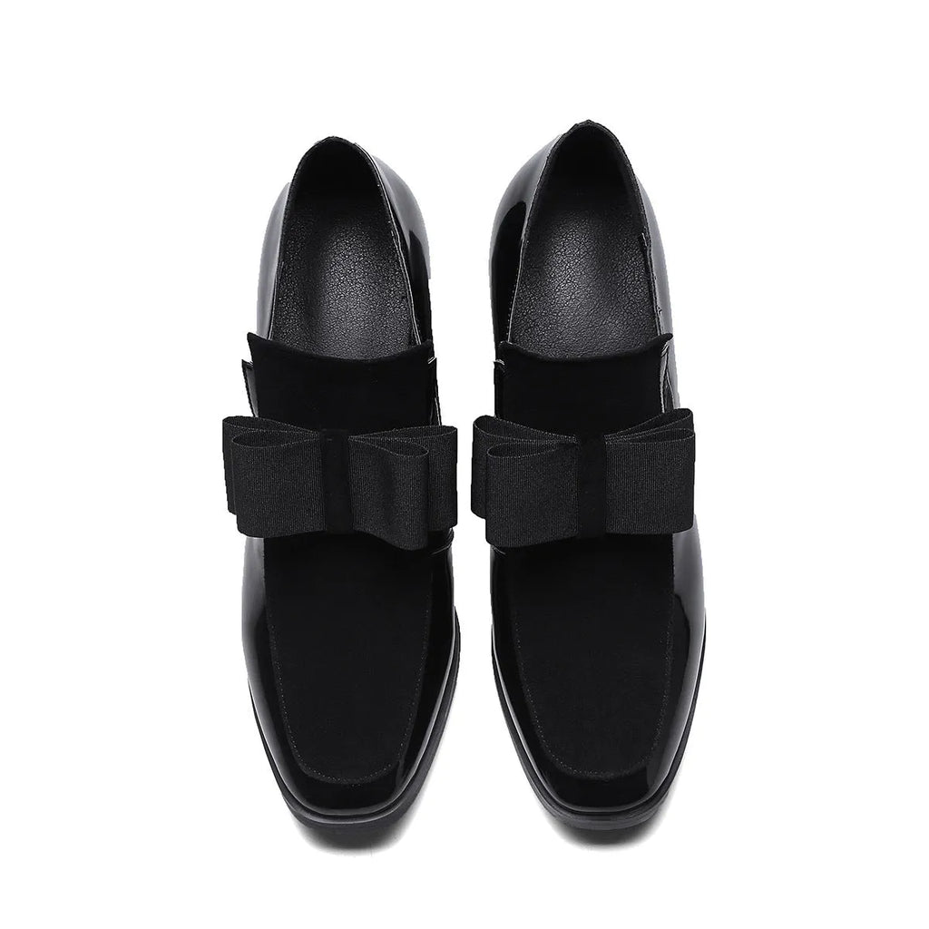 Women's black patent leather high heels with a thick block heel and square toe.