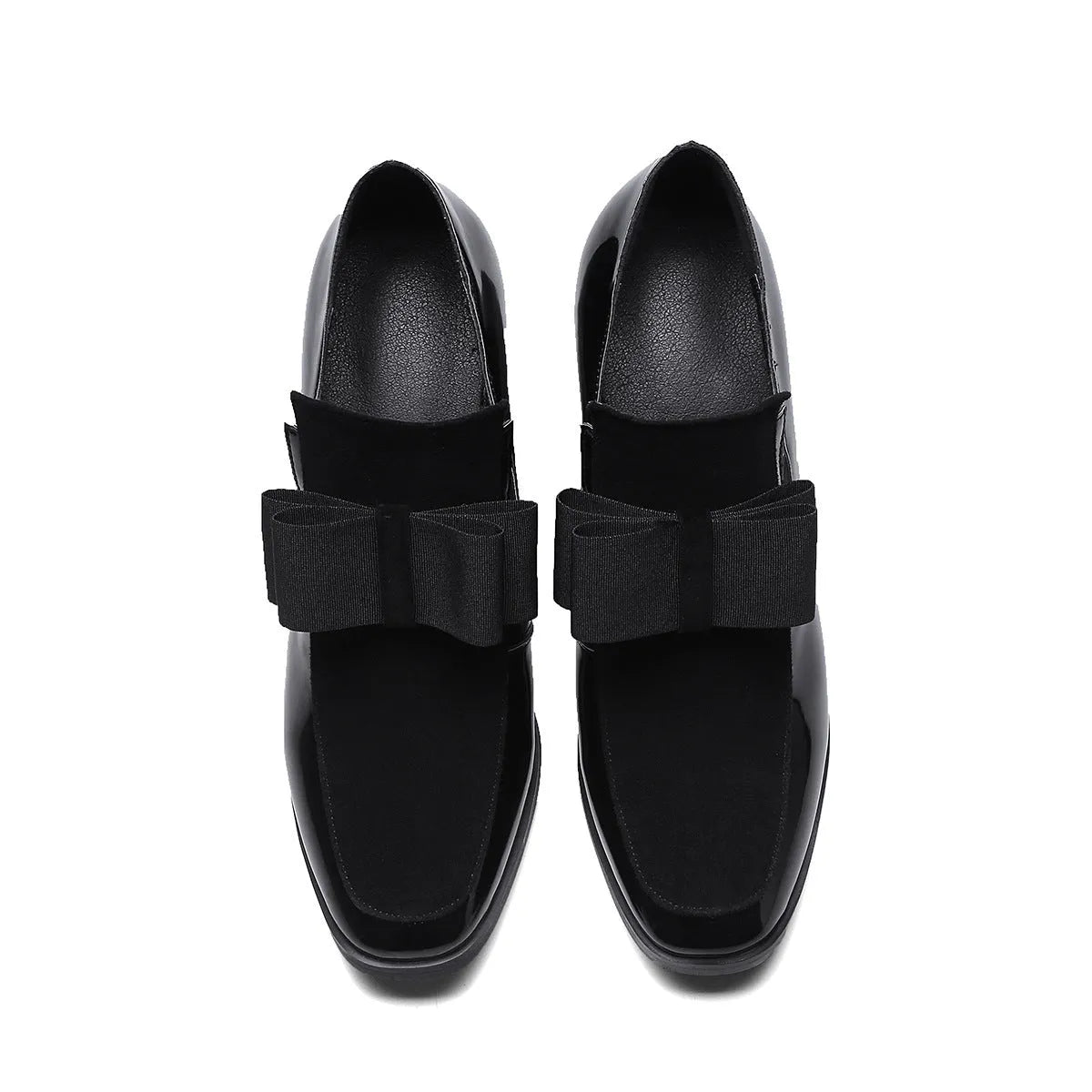 Women's black patent leather high heels with a thick block heel and square toe.