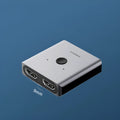 Grey Haibeisi HDMI 1.2 splitter switcher showing one input and two output ports for 4K video distribution