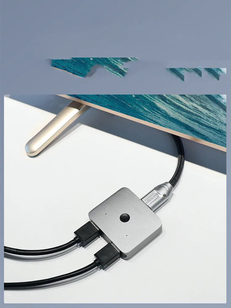 Grey Haibeisi HDMI 1.2 splitter switcher showing one input and two output ports for 4K video distribution