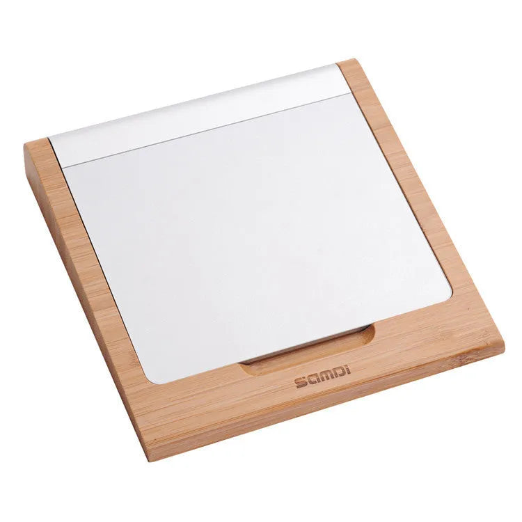 Bamboo wood Apple trackpad bracket showing 15cm size and natural colour