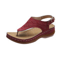 Women's black casual wedge heel flip flop sandals with an adjustable buckle strap.