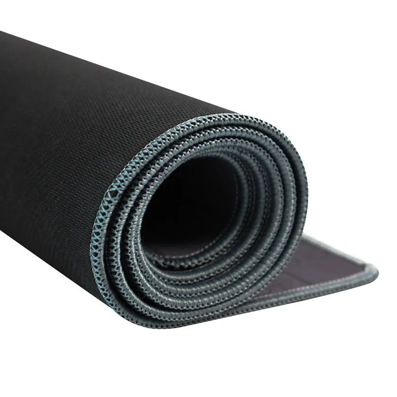 EXCO large grey cloth gaming mouse pad wrist support rest on a desktop.