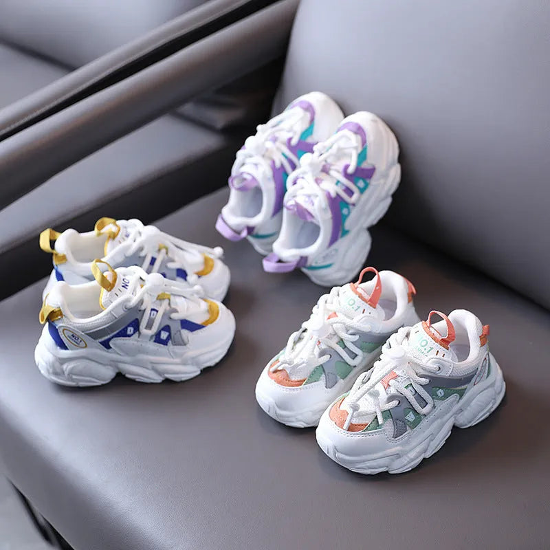 Children's sports shoes in yellow with microfiber and mesh upper and EVA sole