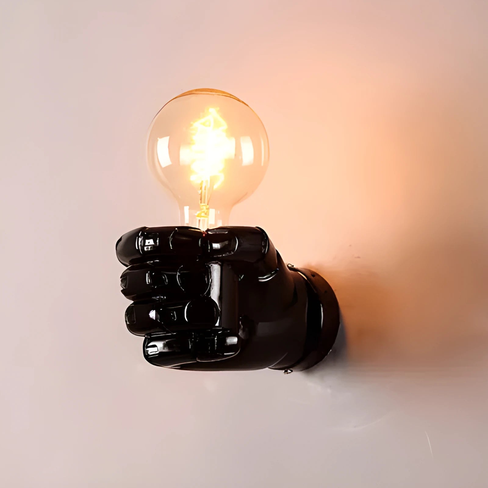Creative resin fist design wall lamp in black, white, or wood grain colour for indoor decoration.