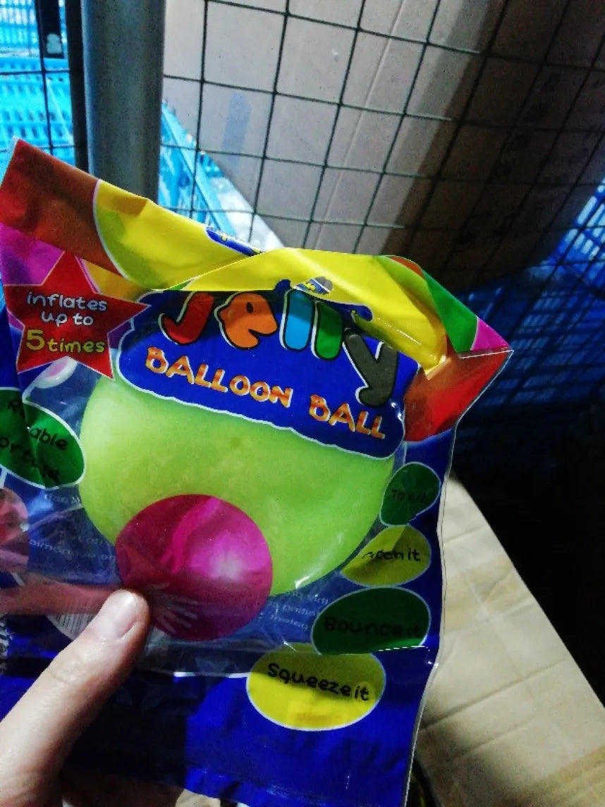 Inflatable TPR bouncy ball in pink, yellow, green, and blue colours with size options from 40 cm to 120 cm diameter