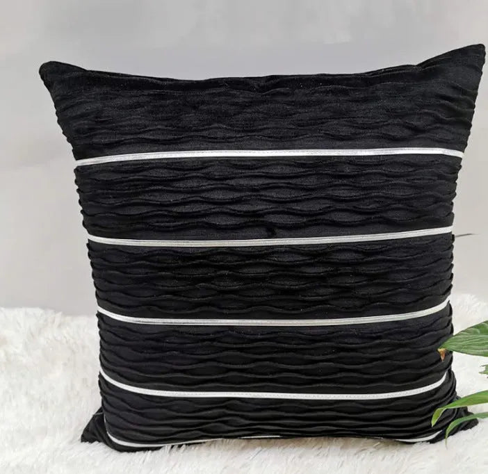 Square striped velvet pillow cover for sofa in multiple colour options on a grey background.