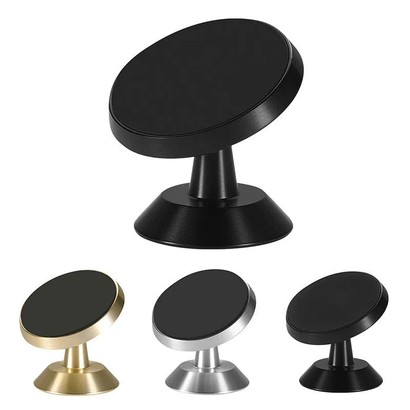 Universal magnetic car phone holder in black, silver, and gold colours on a car dashboard.