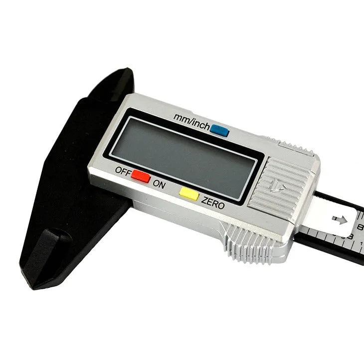 Digital vernier caliper with metal casing, stainless steel guide track, and LCD display showing measurement