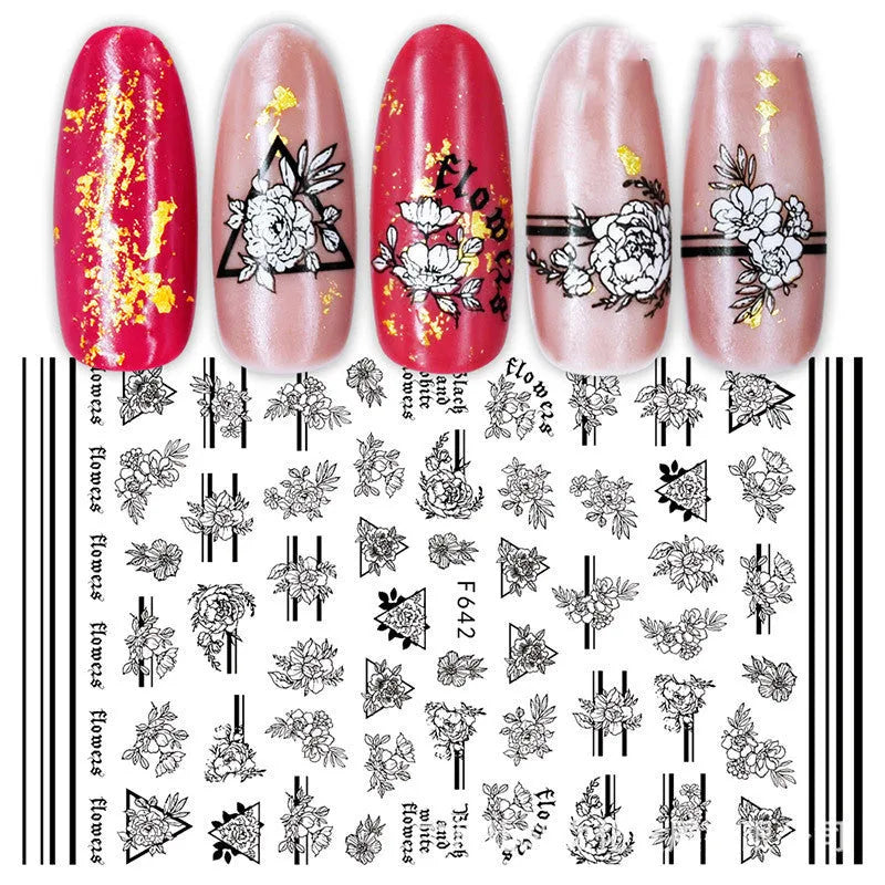 3D hot stamping nail stickers with black and white rose patterns on a hand model