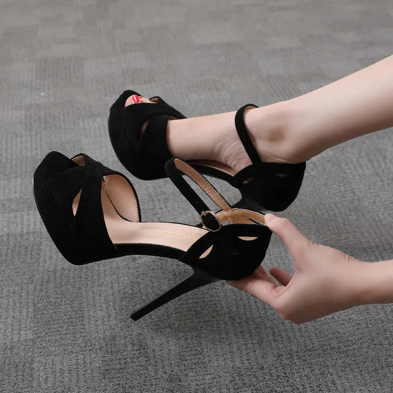 Black Roman style women's platform sandals with stiletto heels and fish mouth toe design