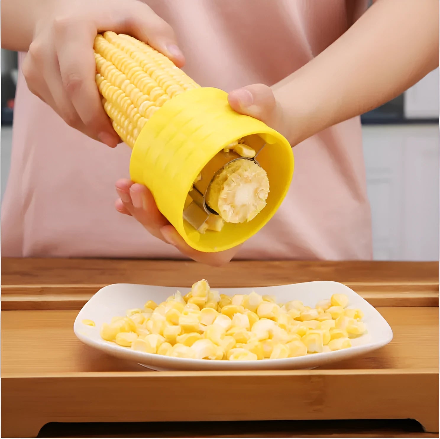 Yellow corn-shaped manual thresher with kernel-patterned handle for removing corn from cobs