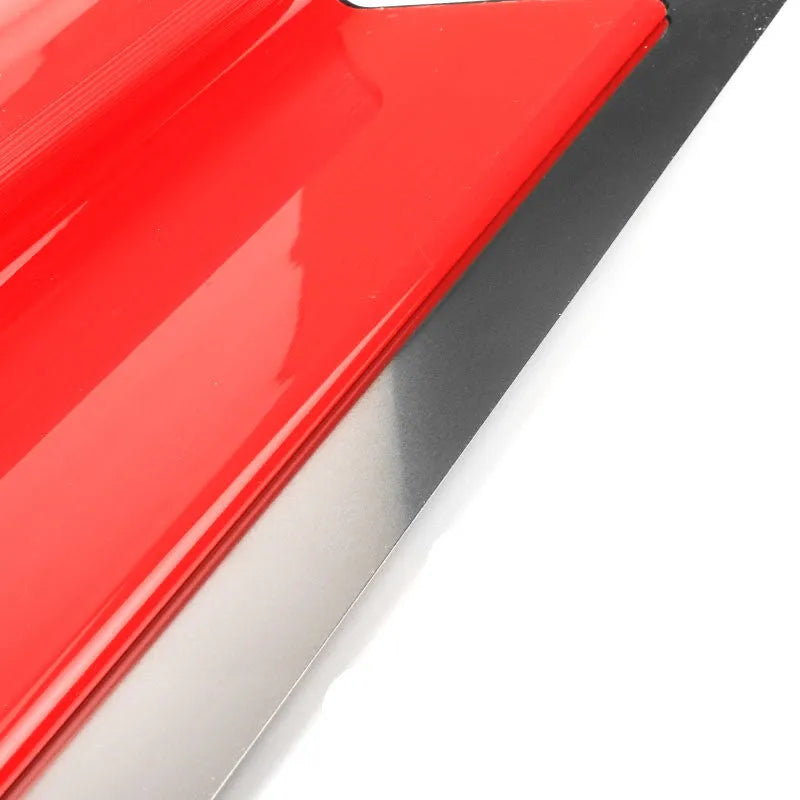 Red-handled leveling scraper tool with a 40 cm steel blade for scraping putty and pasting wallpaper.